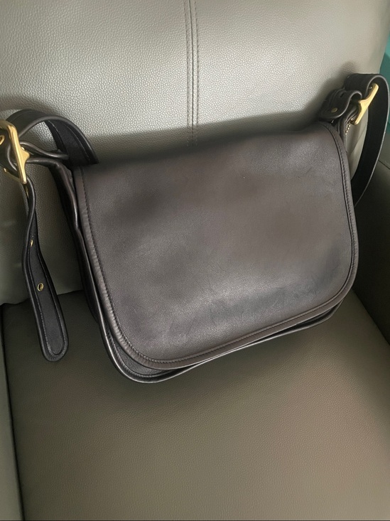 Coach Handbags - vintage black leather Coach Patricia Legacy bag with a classic flap closure and
